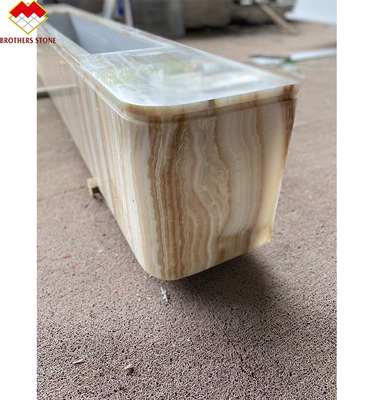 Maßgeschneiderter weißer Onyx-Marmor-TV-Tisch-Stand Set Holz-Look-Zentrumstisch mit weißen Holzvenen Elegante Wohnzimmermöbel
